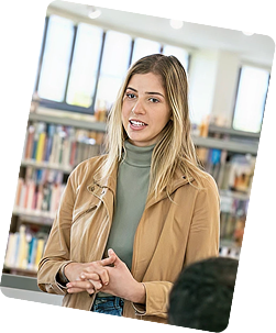 Graduate student holding a book