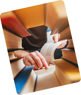 Graduate student holding a book