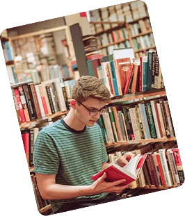 Graduate student holding a book